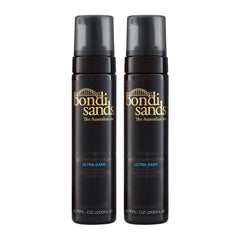 Two black bottles of Bondi Sands Ultra Dark tanning lotion on a white background
