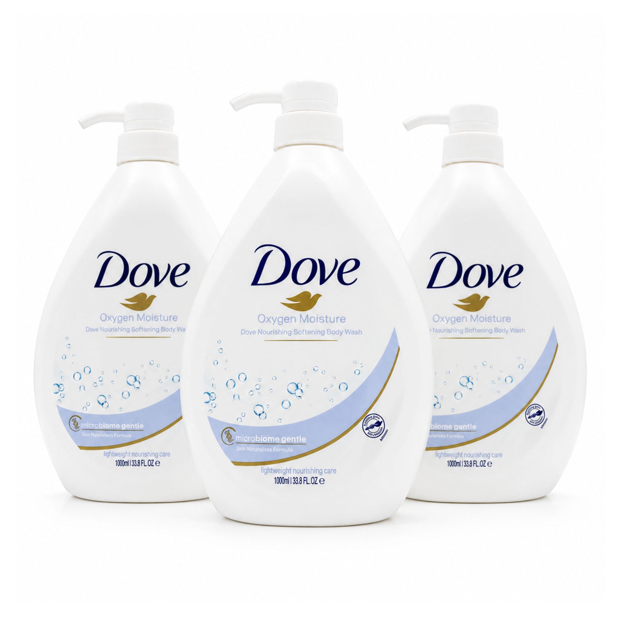 Three white bottles of Dove Pampering Body Wash arranged in a row against a white background, with the center bottle in front and the side bottles slightly behind it.