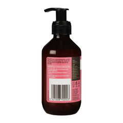 Brown bottle with pump and pink label on a white background