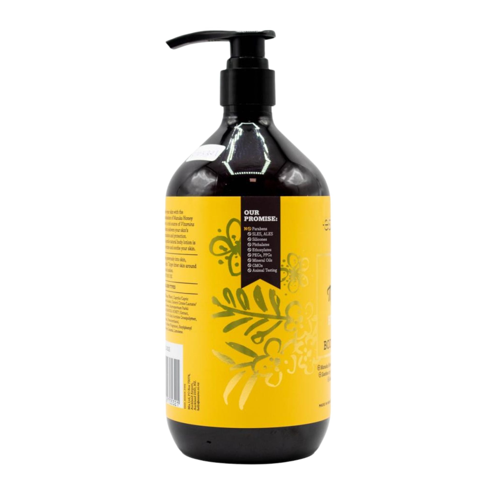 Bottle with yellow label and black pump on a white background
