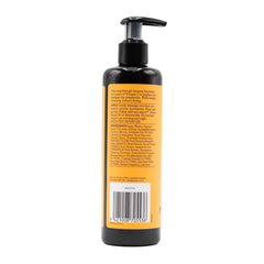 Black bottle with pump and orange label on a white background