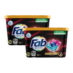 Two containers of Fab laundry detergent on a white background