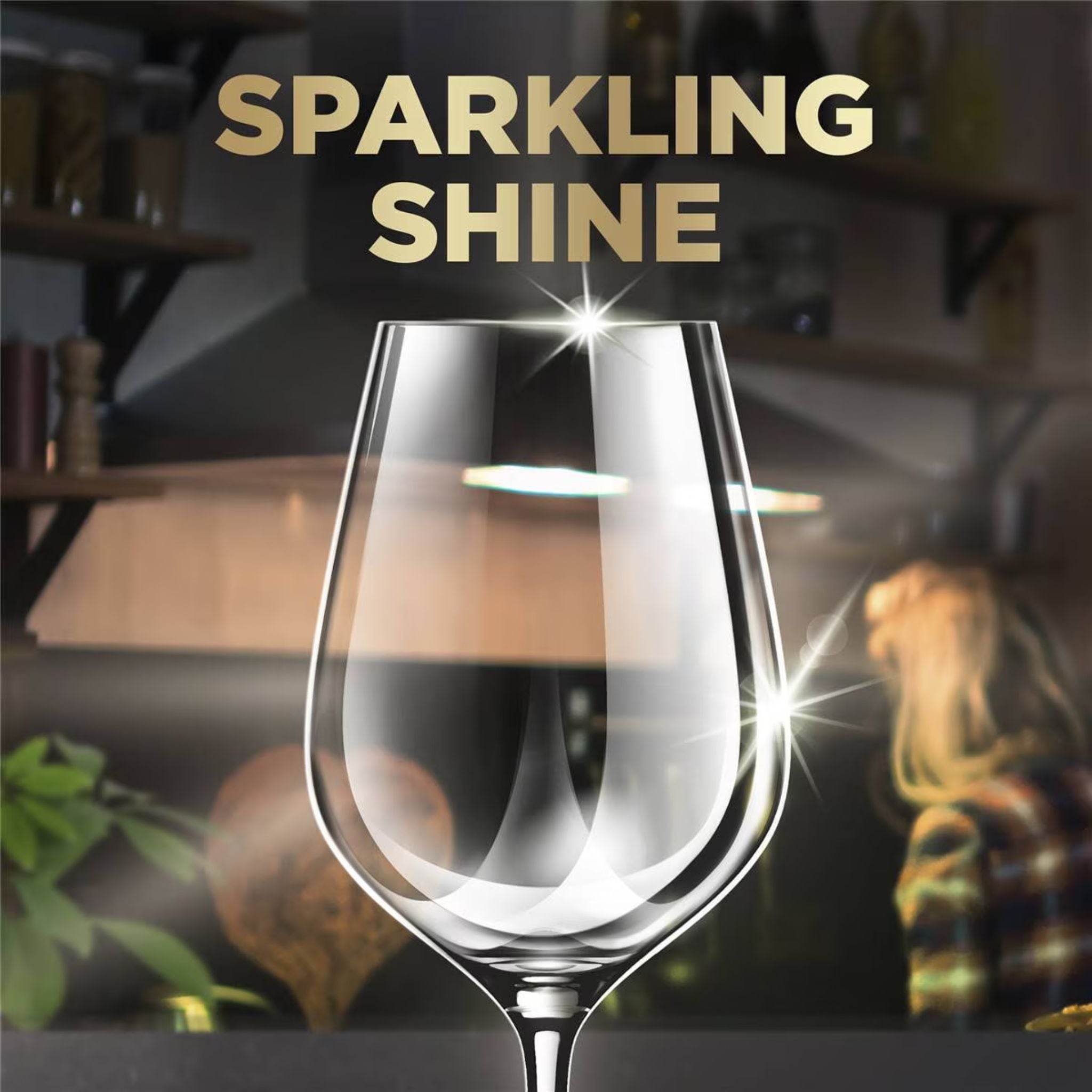 Wine glass with 'Sparkling Shine' text in a blurred indoor setting