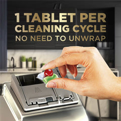 Hand placing a tablet into a cleaning device with kitchen background