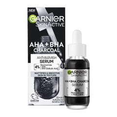 Garnier SkinActive AHA+BHA Charcoal serum bottle and packaging on a white background