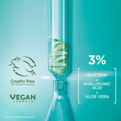 Vial with green liquid on a teal background, featuring cruelty-free and vegan labels.