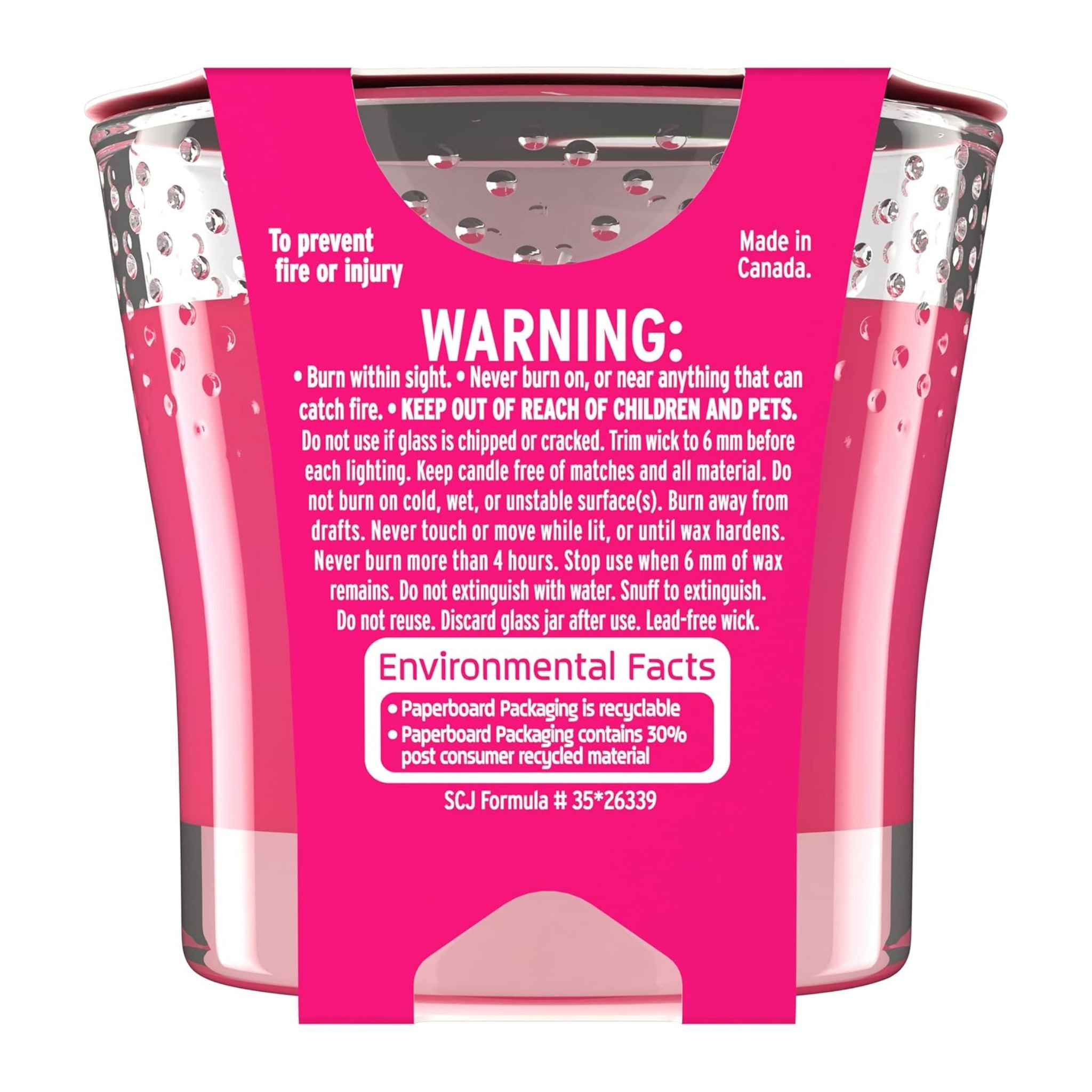 Pink candle jar with warning label and environmental facts on a white background