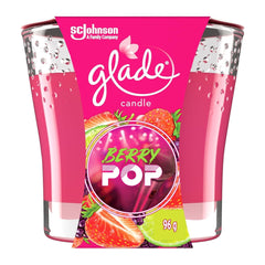 Glade Berry Pop candle packaging with pink label and fruit illustration on a white background