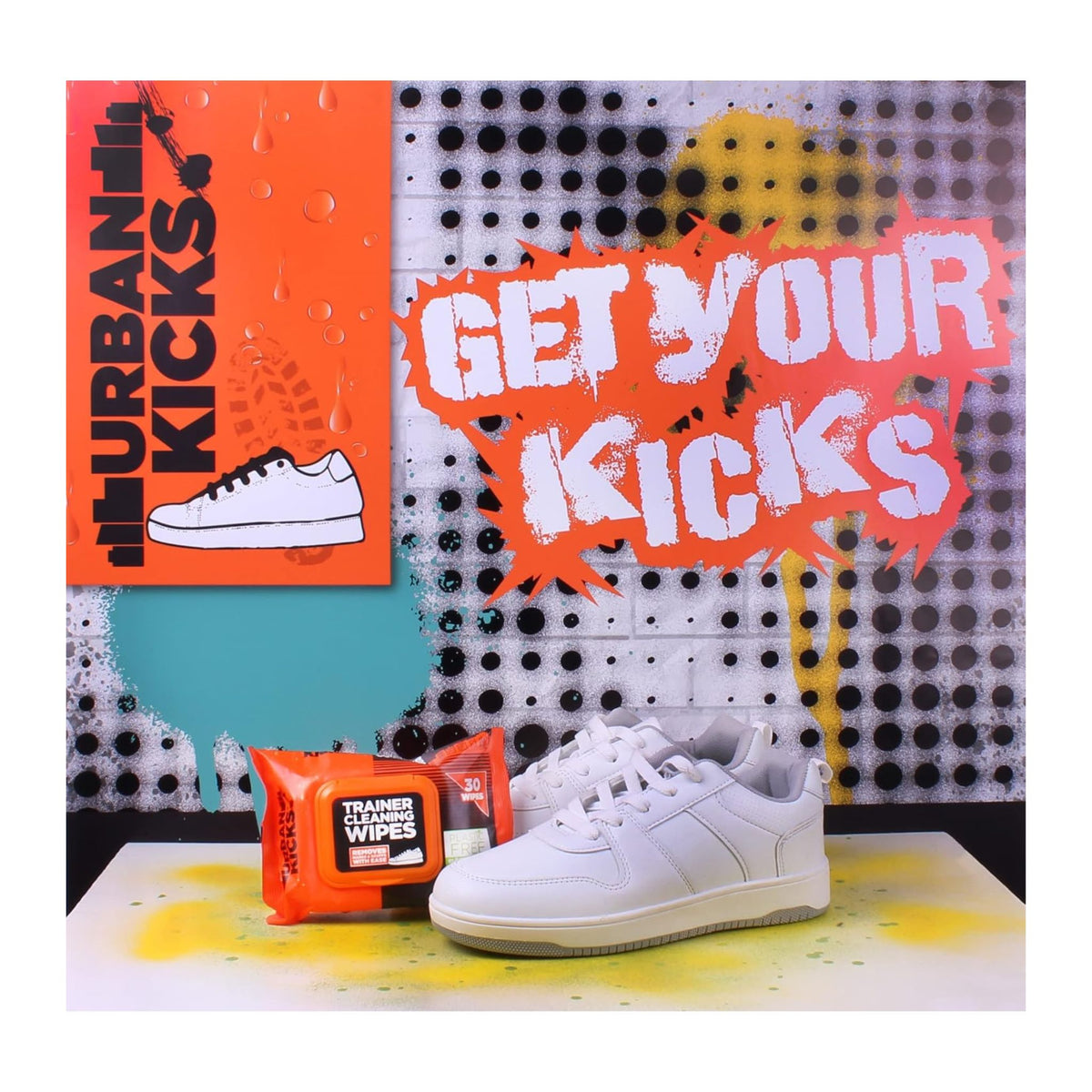 White sneakers with Urban Kicks packaging and 'Get Your Kicks' text on a colorful background