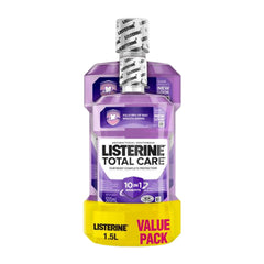 Listerine Total Care mouthwash bottle with purple and yellow packaging on a white background