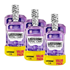 Three bottles of Listerine Total Care mouthwash with purple packaging and yellow labels on a white background.