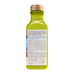 Green bottle with gold cap on a white background