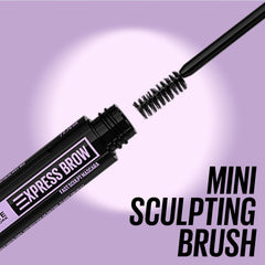 Close-up of Maybelline Xpress Brow Gel mini sculpting brush showing precise applicator for shaping and taming brows.