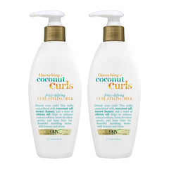 Two bottles of OGX Quenching Coconut Curls Curl Styling Milk on a white background