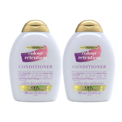 Two bottles of OGX Colour Care Colour Retention Conditioner on a white background