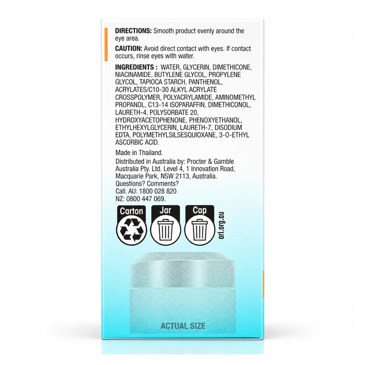 A boxed cosmetic product shown from the back, with a white upper section containing text directions, cautions, ingredients, and icons, and a translucent light blue lower section. The product inside appears to be a small clear jar with a white cap, and the box includes Procter & Gamble branding.
