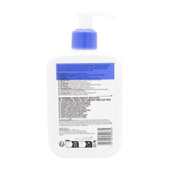 Back view of a bottle with a blue cap and label on a white background