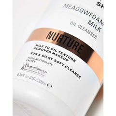 Meadowfoam Milk Oil Cleanser bottle with 'Nurture' label on a white background
