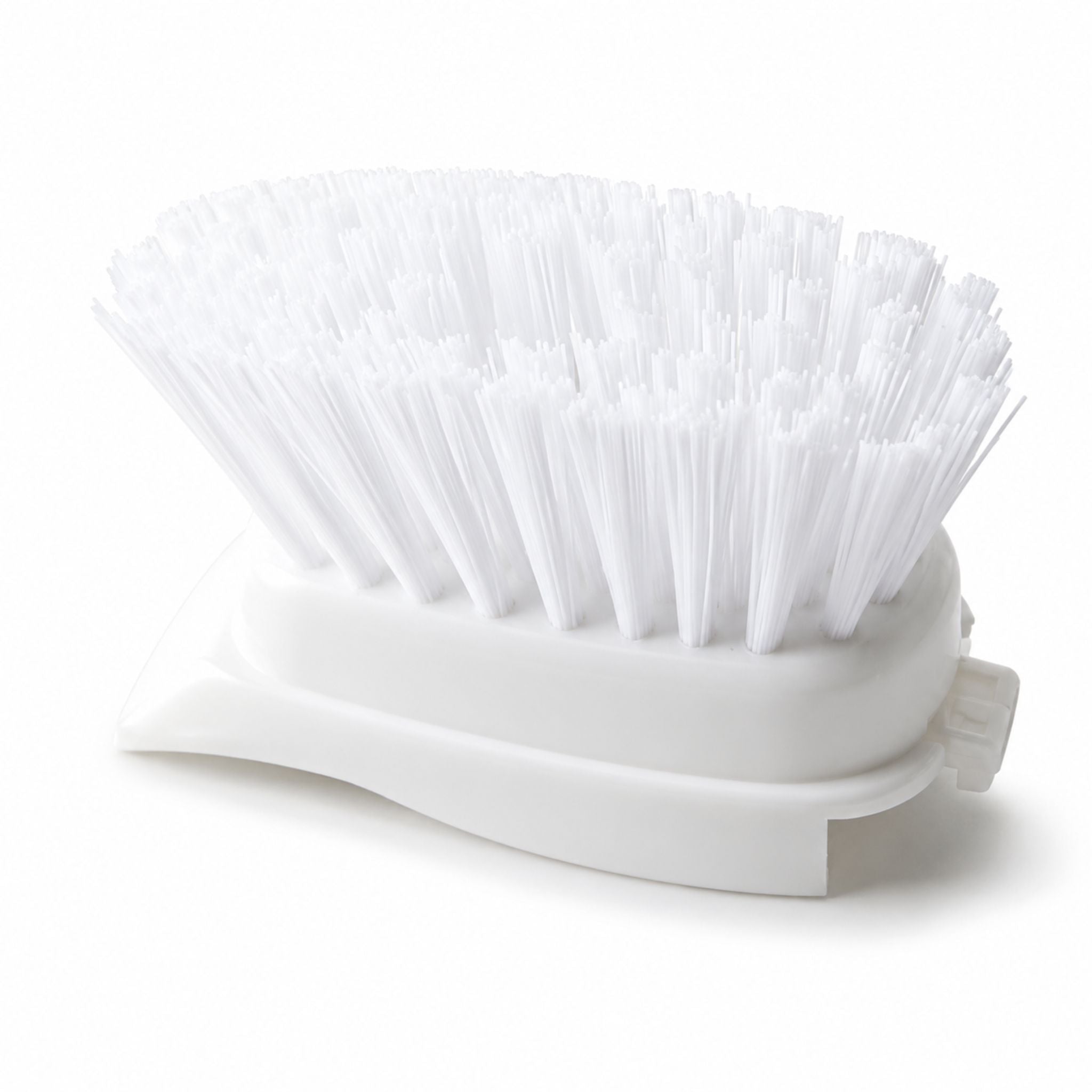 A white plastic cleaning brush with dense white bristles and a molded handle, photographed on a clean white background.