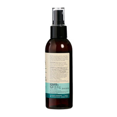 Brown spray bottle with a label on a white background